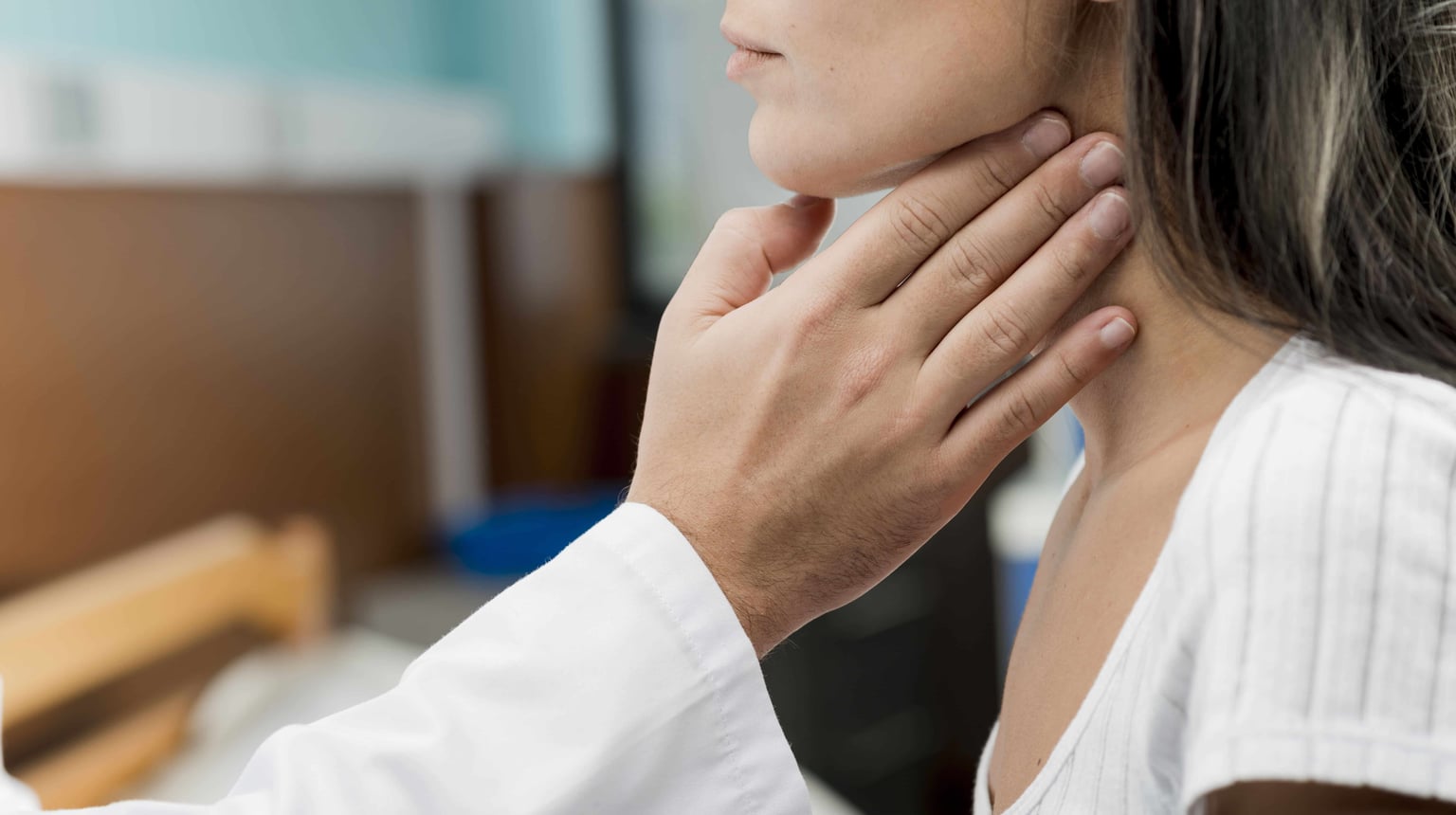 Person with throat discomfort.
